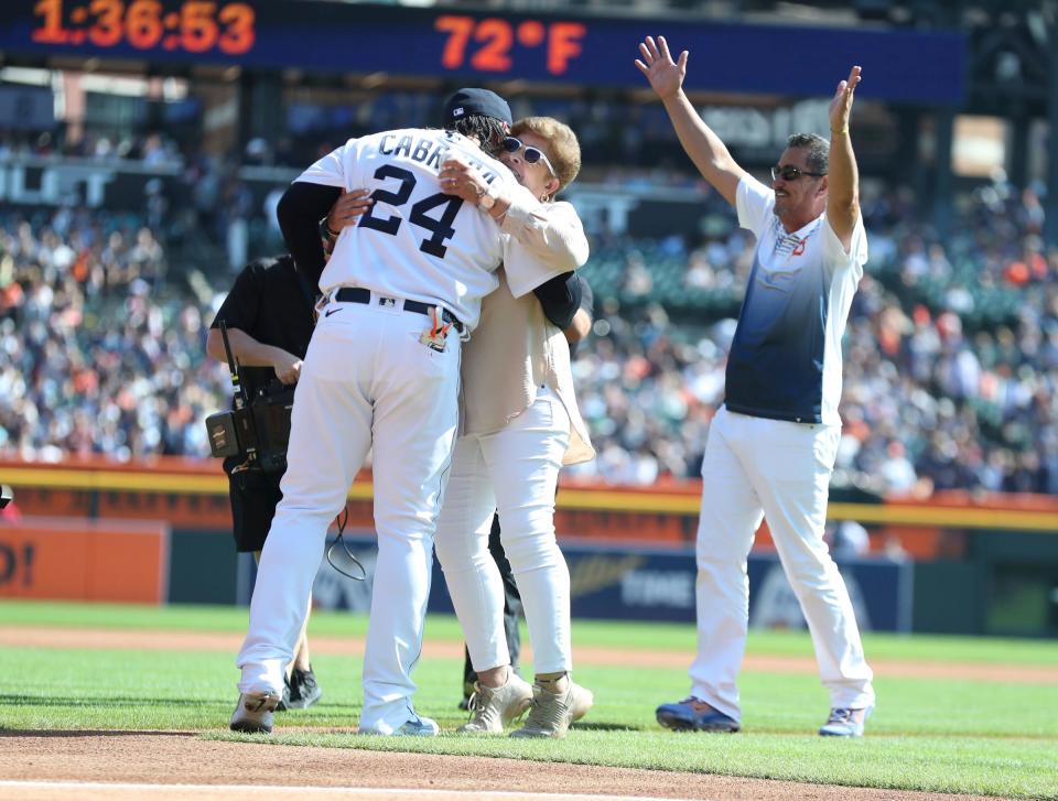 Detroit Tigers designated hitter Miguel Cabrera (24) embraces mom Gregoria Torres and dad Miguel Cabrera Sr. after both threw out the first pitch during pregame ceremonies before the game against the Cleveland Guardians at Comerica Park in Detroit on Saturday, Sept. 30, 2023.