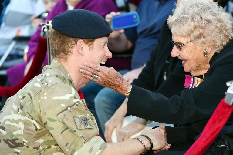 Britain's Prince Harry (L) speaks with Daphne Dunne from Turramurra during a visit to the Sydney Opera House, on May 7, 2015