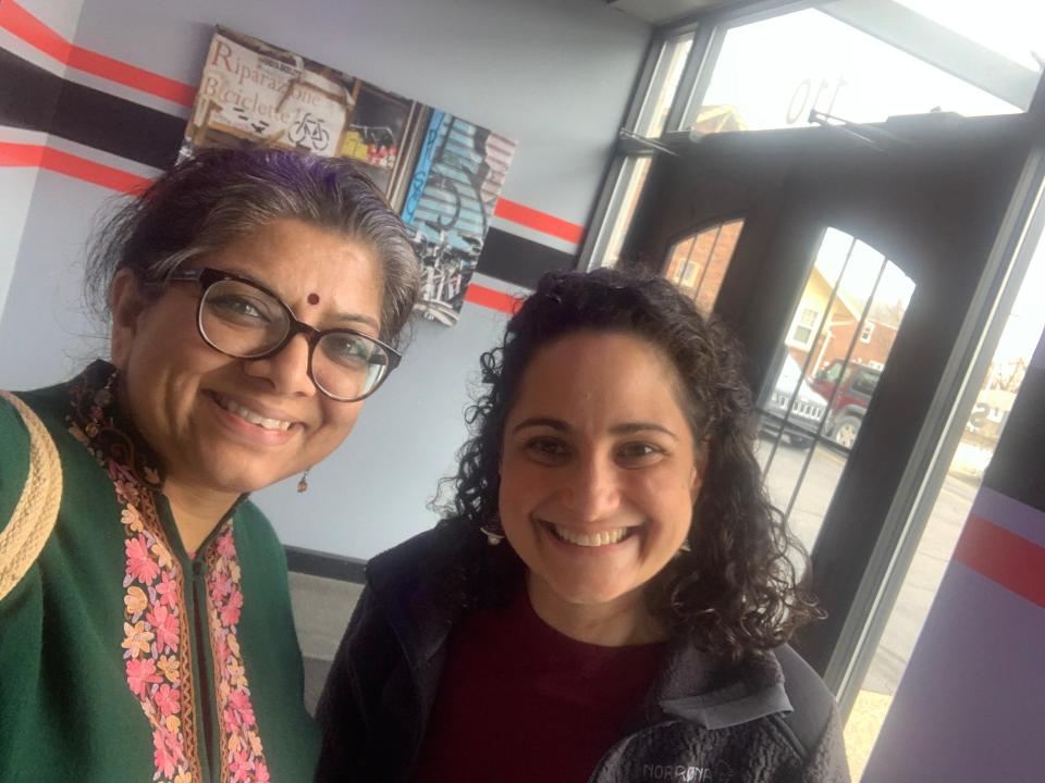 Samantha Woll, right, president of the board of the Downtown Synagogue in Detroit, with her friend, former state Rep. Padma Kuppa, a Democrat who had represented Troy and Clawson, on April 3 at Zeoli's Italian restaurant in Clawson. Woll was Kuppa's campaign manager when she ran in 2018, becoming the first Indian American woman and first Hindu in the Michigan Legislature.