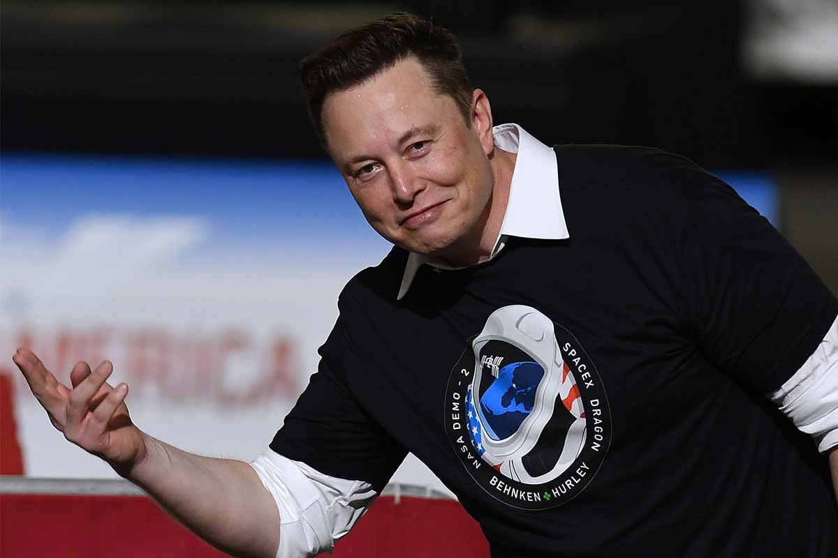 SpaceX founder Elon Musk gestures to the audience after being recognized by U.S. President Donald Trump at NASA's Vehicle Assembly Building following the successful launch of a Falcon 9 rocket with the Crew Dragon spacecraft from pad 39A at the Kennedy Space Center. NASA astronauts Doug Hurley and Bob Behnken will rendezvous and dock with the International Space Station, becoming the first people to launch into space from American soil since the end of the Space Shuttle program in 2011.