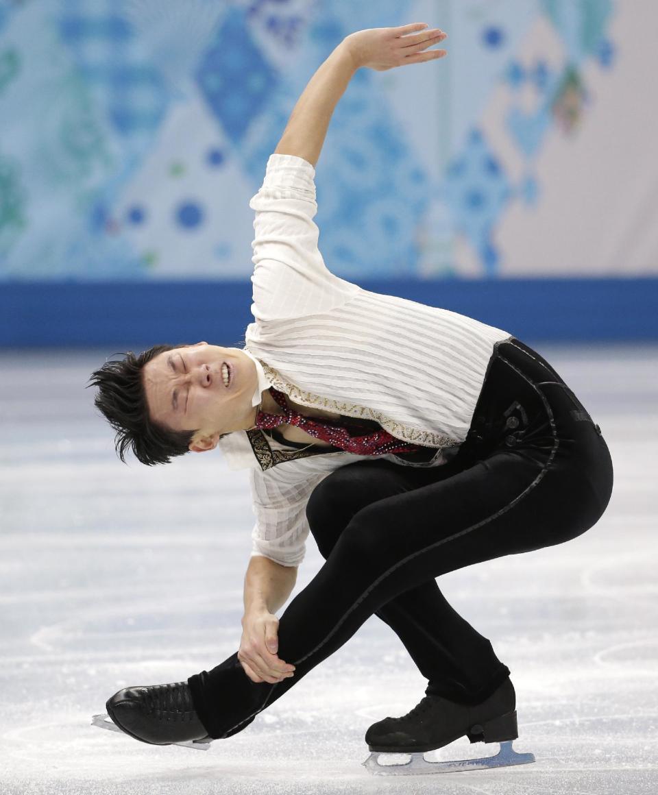 Denis Ten of Kazakhstan competes in the men's free skate figure skating final at the Iceberg Skating Palace during the 2014 Winter Olympics, Friday, Feb. 14, 2014, in Sochi, Russia. (AP Photo/Bernat Armangue)