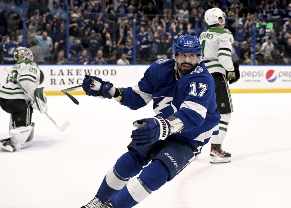 Tampa Bay Lightning left wing Alex Killorn (17) celebrates his overtime goal against the Dallas Stars in an NHL hockey game Tuesday, Nov. 15, 2022, in Tampa, Fla. (AP Photo/Jason Behnken)