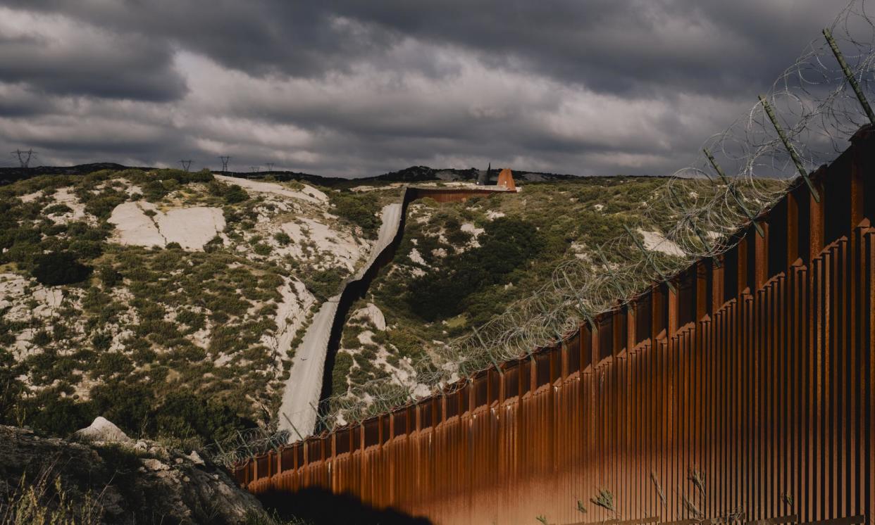 <span>The US-Mexico border wall in Campo, California.</span><span>Photograph: Bloomberg/Getty Images</span>