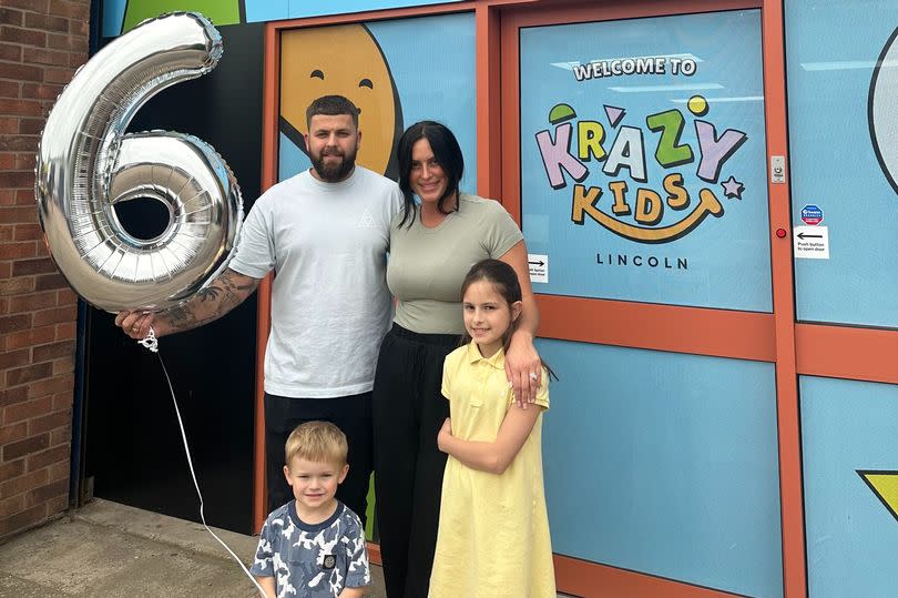 Krazy Kids owner Stephanie Bellamy celebrating six months of being open with husband Ryan, son Rory and daughter Destiny