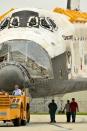 Space Shuttle Discovery leaves the Vehicle Assembly Building (VAB) on its way to the Orbiter Processing Facility at Kennedy Space Center August 11, 2011 in Cape Canaveral, Florida. Space Shuttles Endeavour and Discovery switched buildings as they are being decommissioned with the end of the Shuttle program. (Photo by Roberto Gonzalez/Getty Images)