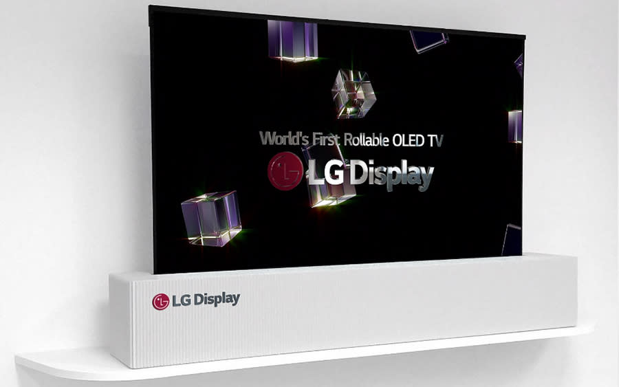 LG’s prototype TV rolls upward or downward into the box below, to fit the video material.