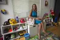 Chief executive of California-based social and educational group for parents Club MomMe Rachel Pitzel poses for a picture at her home in Playa Vista, California, June 10, 2015. REUTERS/Mario Anzuoni