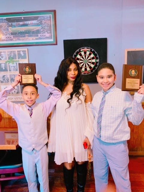 Daigre Thomas, with her 12-year-old twin sons Jordan and Jayden