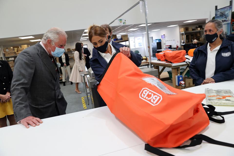 Britain's Prince Charles, Prince of Wales gestures during a visit to BCB International, a supplier of protective, medical and defence equipment, in Cardiff on May 14, 2021, during his day-long visit to Wales. (Photo by Chris Jackson / POOL / AFP) (Photo by CHRIS JACKSON/POOL/AFP via Getty Images)