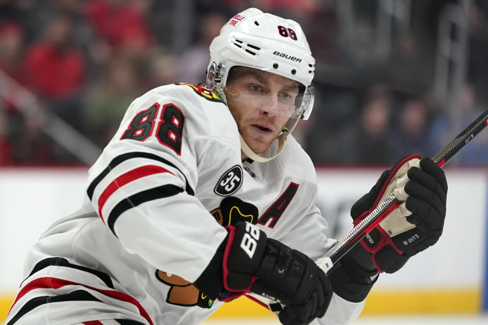 Chicago Blackhawks right wing Patrick Kane plays against the Detroit Red Wings in the third period of an NHL hockey game, Jan. 26, 2022, in Detroit. Kane is signing with the Red Wings, a person with knowledge of the decision tells The Associated Press. Kane is expected to sign a contract for the remainder of the NHL season. The 35-year-old is coming off hip resurfacing surgery done to try to move past a nagging injury. (AP Photo/Paul Sancya, file)