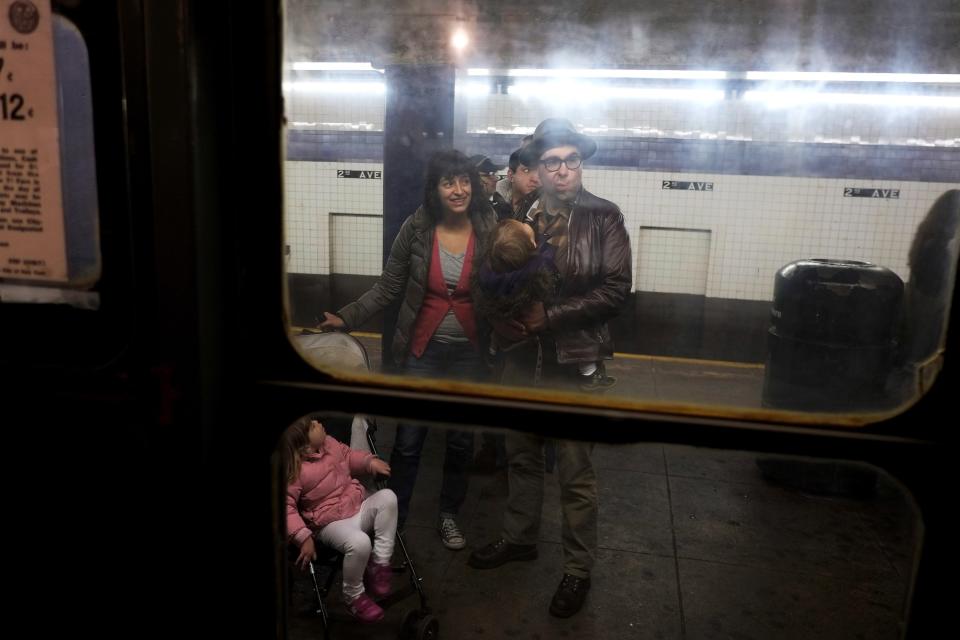 Riders Enjoy Vintage New York City Subway Trains In Annual Holiday Tradition