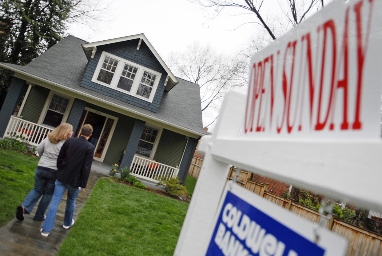 Prospective buyers visit an open house for sale in Alexandria, Virginia. (Credit: Jonathan Ernst, Reuters)  