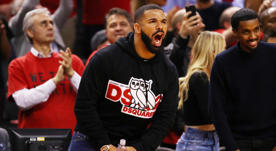 TORONTO, ONTARIO - MAY 21: Rapper Drake reacts during game four of the NBA Eastern Conference Finals between the Milwaukee Bucks and the Toronto Raptors at Scotiabank Arena on May 21, 2019 in Toronto, Canada. NOTE TO USER: User expressly acknowledges and agrees that, by downloading and or using this photograph, User is consenting to the terms and conditions of the Getty Images License Agreement. (Photo by Gregory Shamus/Getty Images)