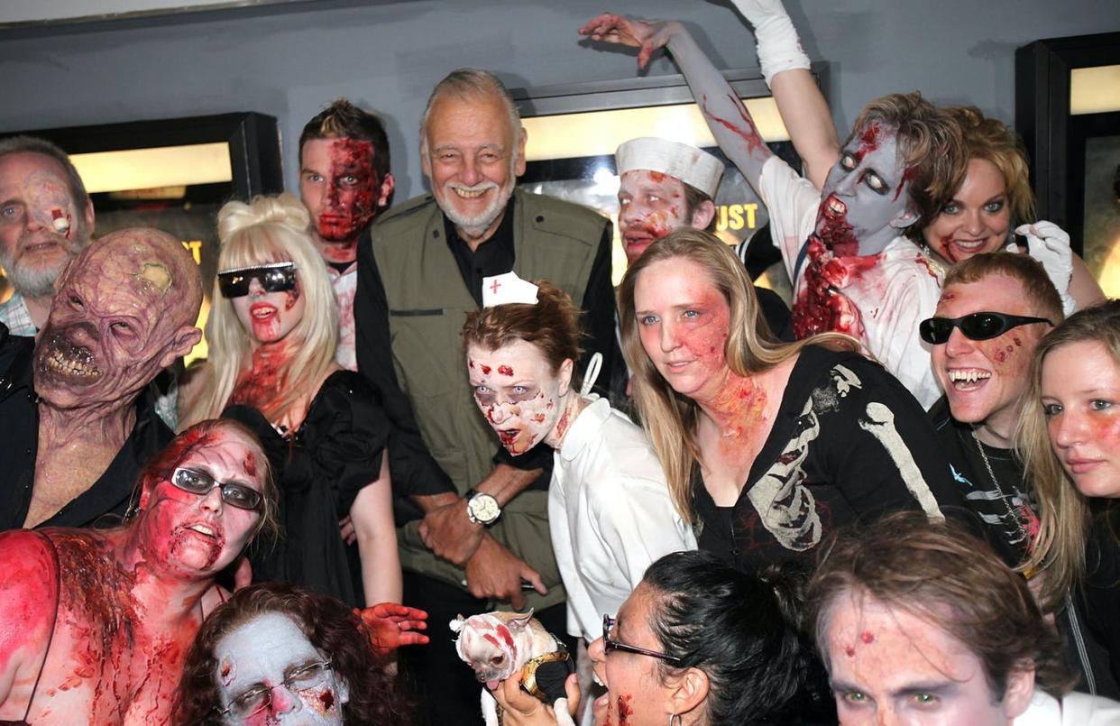 <span class="caption">Filmmaker George Romero at the premiere of 'Survival of the Dead' in 2010. </span> <span class="attribution"><a class="link " href="https://www.gettyimages.com/detail/news-photo/director-george-a-romero-and-zombies-attend-the-premiere-of-news-photo/99605569" rel="nofollow noopener" target="_blank" data-ylk="slk:Ben Hider/Getty Images;elm:context_link;itc:0;sec:content-canvas"> Ben Hider/Getty Images</a></span>