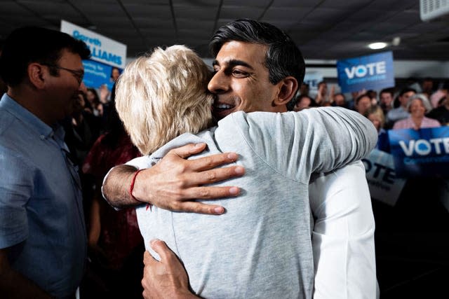 Rishi Sunak hugs someone