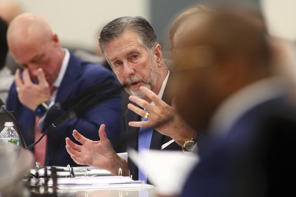 Sen. Jim Boyd, R-Bradenton gestures as he answers a question during the Committee on Banking and Insurance meeting Monday, Dec. 12, 2022 at the Capitol in Tallahassee, Fla. Florida lawmakers are meeting to consider ways to shore up the state's struggling home insurance market in the year's second special session devoted to the topic. (AP Photo/Phil Sears)