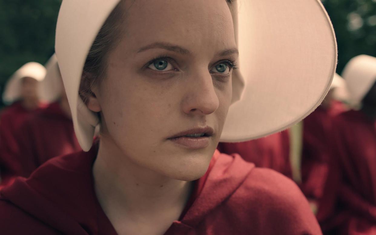 Elisabeth Moss as Offred in The Handmaid's Tale - (Channel 4 images must not be altered or manipulated in any way) Channel 4 Picture Publicity, Horseferry Road, London, SW1P 2TX