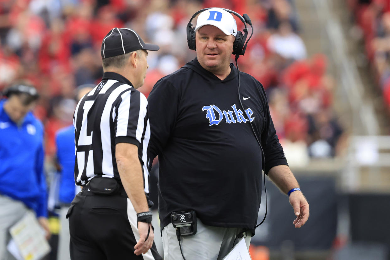 Mike Elko of the Duke Blue Devils talks to an official during a game in 2023. (Justin Casterline/Getty Images)