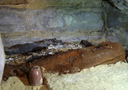 A number of mummies are seen inside the newly discovered burial site near Egypt's Saqqara necropolis, in Giza Egypt July 14, 2018. REUTERS/Mohamed Abd El Ghany