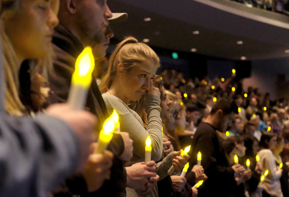 People gather to pray for the victims of a mass shooting at a candlelight vigil in Thousand Oaks, Calif., on Thursday. (Photo: Ringo H.W. Chiu/AP)