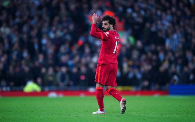 Mohamed Salah applauds the crowd