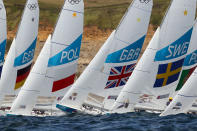 WEYMOUTH, ENGLAND - JULY 29: Iain Percy and Andrew Simpson of Great Britain in action during the Star class race at the London 2012 Olympic Games at the Weymouth & Portland Venue at Weymouth Harbour on July 29, 2012 in Weymouth, England. (Photo by Richard Langdon/Getty Images)