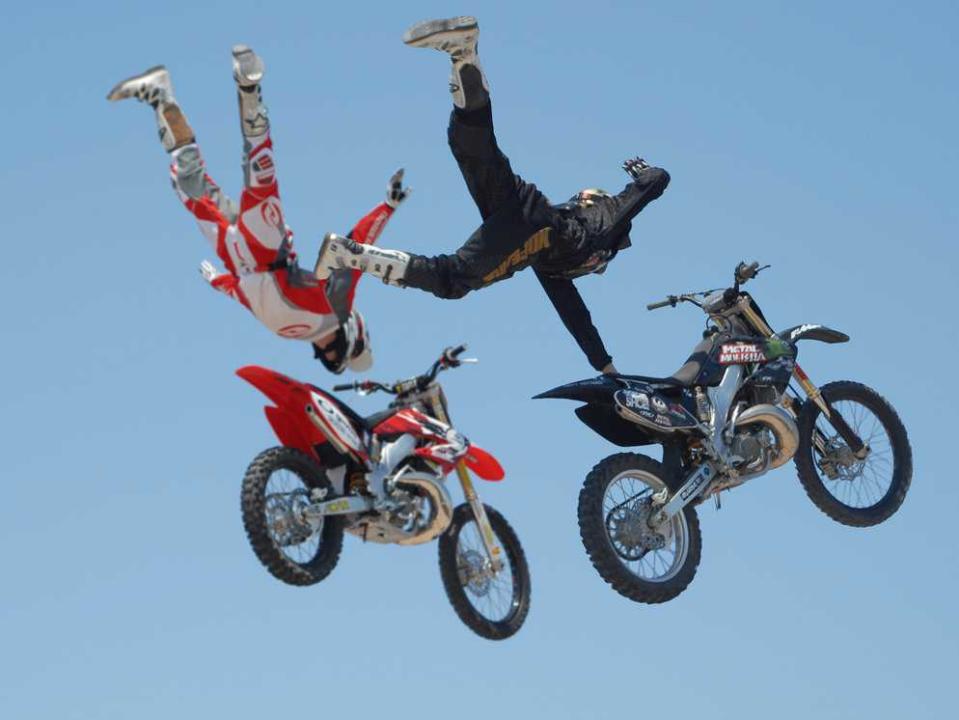 bike stunt flying through air