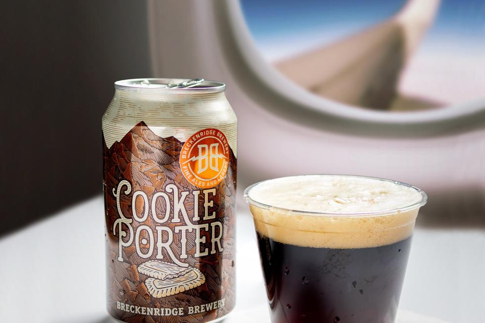 Breckenridge Cookie Porter Can and Cup on an airplane