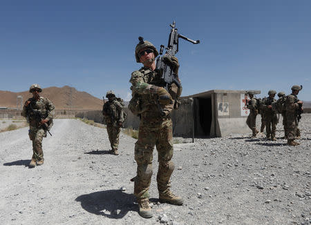 U.S. troops patrol at an Afghan National Army (ANA) base in Logar province, Afghanistan August 7, 2018. REUTERS/Omar Sobhani/Files