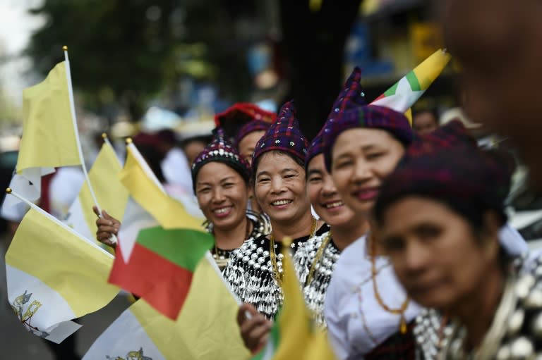 Kachin people in traditional dress were among the crowds hoping to catch a glimpse of Pope Francis when he arrives in Myanmar