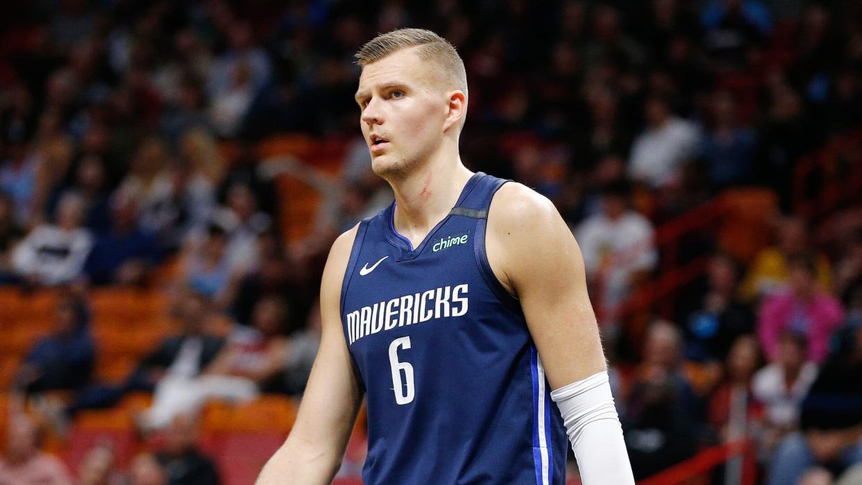 MIAMI, FLORIDA - FEBRUARY 28:  Kristaps Porzingis #6 of the Dallas Mavericks looks on against the Miami Heat during the second half at American Airlines Arena on February 28, 2020 in Miami, Florida.