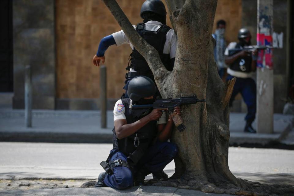 Police officers carry out an anti-gang operation in the Lalue neighborhood of Port-au-Prince, Haiti, Friday, March 3, 2023.