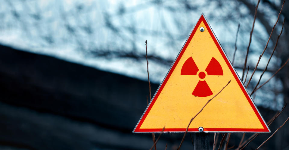 Sign of radiation hazard against radioactive waste, picture with a place for your text, copy space, your text here.