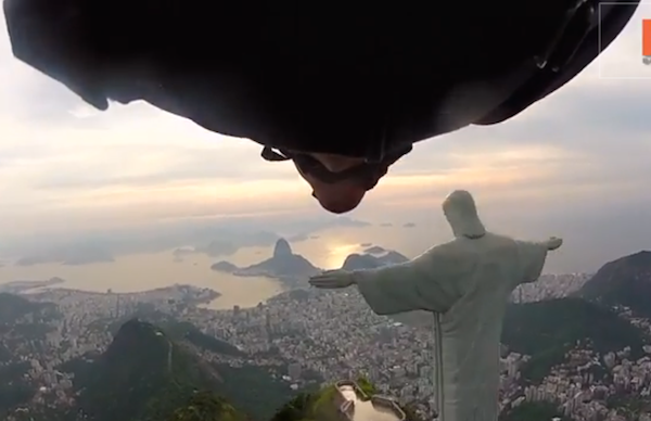Rio de Janiero's Christ the Redeemer Statue gets buzzed by two guys in wing suits.