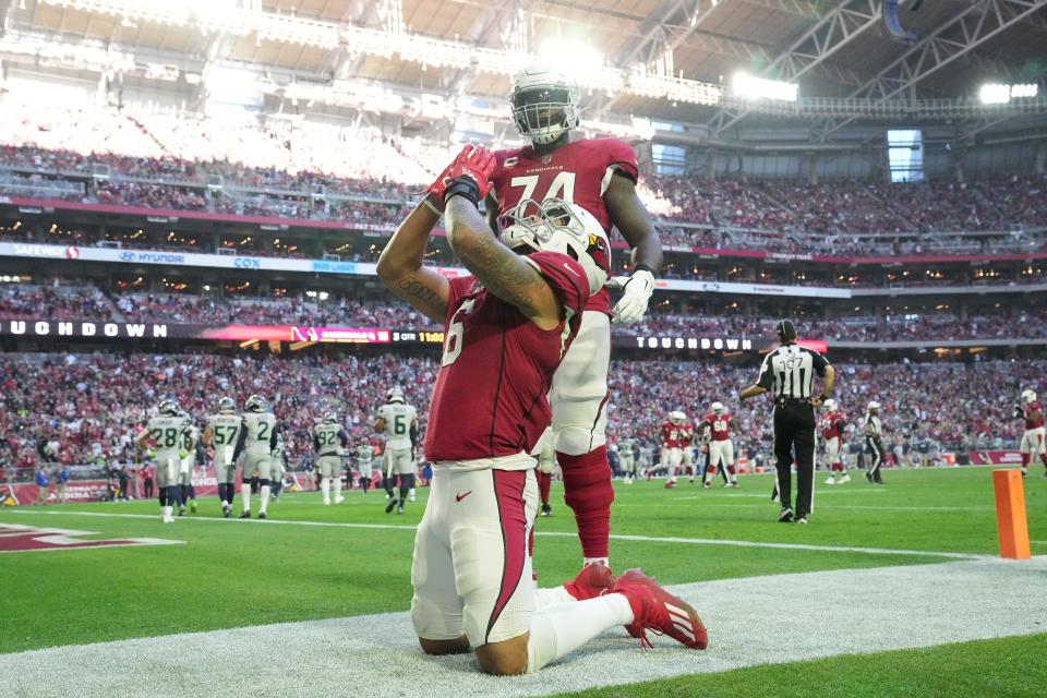 Arizona Cardinals running back James Conner (6) celebrates after scoring against the Seattle Seahawks during the third quarter against the Seattle Seahawks on Jan. 9 in Glendale, Arizona.