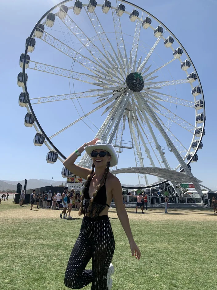 The author standing in front of the ferris wheel at Coachella