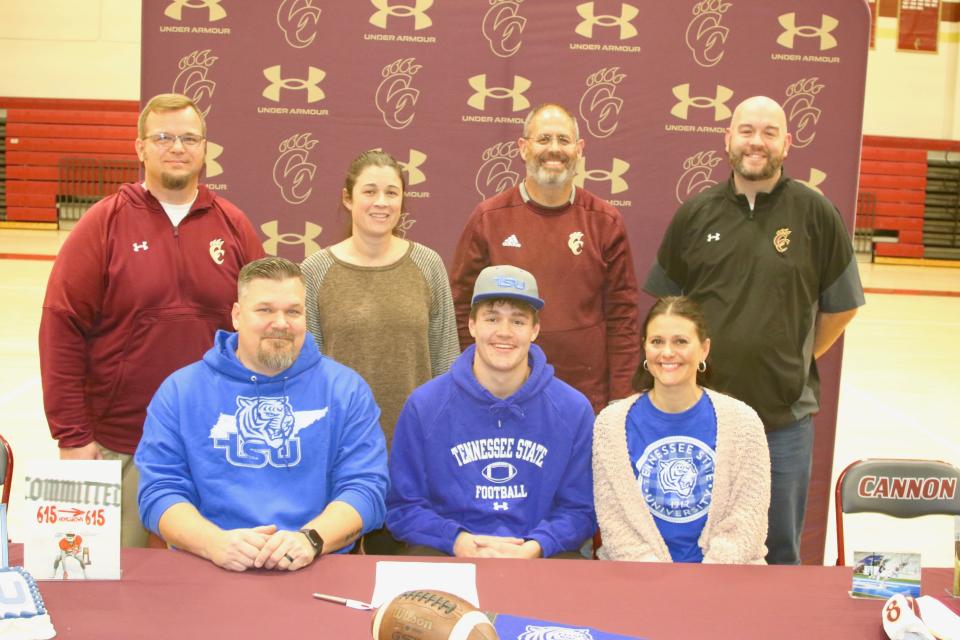 Cannon County DE/TE Tucker Kyne became the first Lions football player to sign a Division I scholarship in almost 40 years when he signed with Tennessee State on Wednesday. Pictured in the front row (l-r) are Peter Kyne (father), Tucker Kyne and Paula Kyne (mother). In the back row (l-r) are Cannon County coach Matt Daniel, Cannon County athletic director Lydia Garrett, Cannon County principal Courtney Nichols and Cannon County assistant principal Shane Hollandsworth.