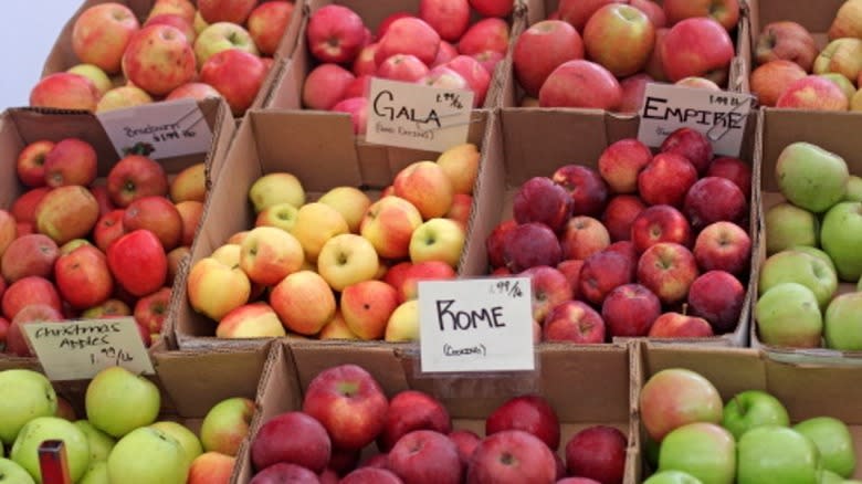 crates of apples at farmers market