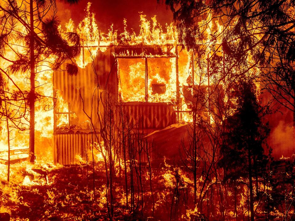 A home in Greenville is engulfed by flames.