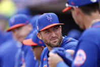 FILE - In this Feb 22, 2020, file photo, New York Mets' Tim Tebow looks back in the dugout during a spring training baseball game against the Miami Marlins in Port St. Lucie, Fla. Tebow and coach Urban Meyer are together again, this time in the NFL and with Tebow playing a new position. The former Florida star and 2007 Heisman Trophy-winning quarterback signed a one-year contract with the Jacksonville Jaguars on Thursday, May 20, 2021, and will attempt to revive his pro career as a tight end. (AP Photo/Vera Nieuwenhuis, File)