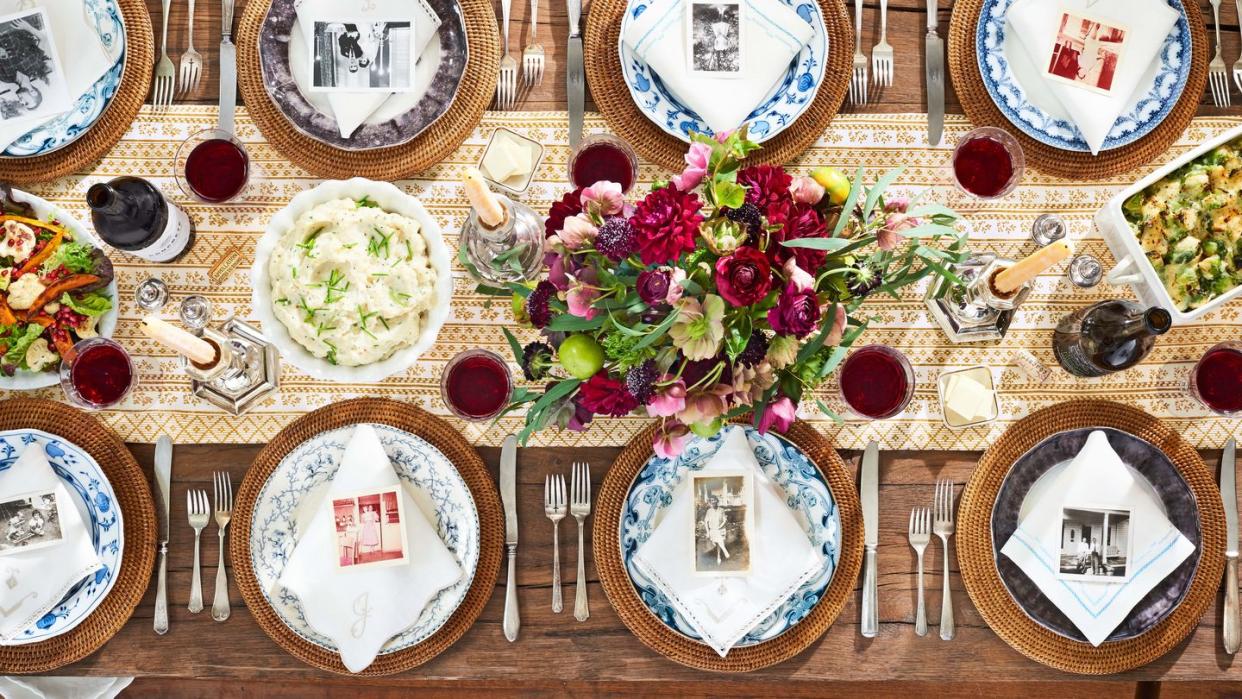 floral thanksgiving centerpiece, old family photos on plates as placecards