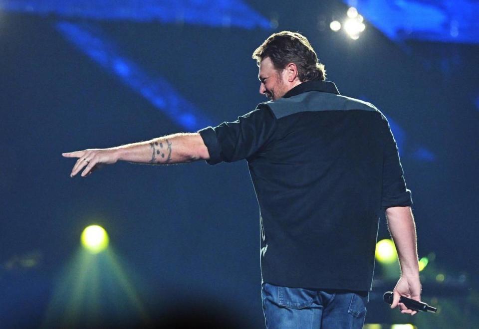 Singer Blake Shelton points to a fan as he performs at the Save Mart Center Thursday night, March 21, 2024 in Fresno.
