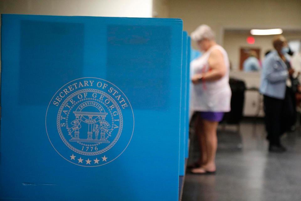 Voters cast their ballots at the Progressive Recreation Center in Garden City, Georgia on May 24, 2022.