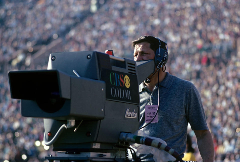 cbs cameraman filming a game