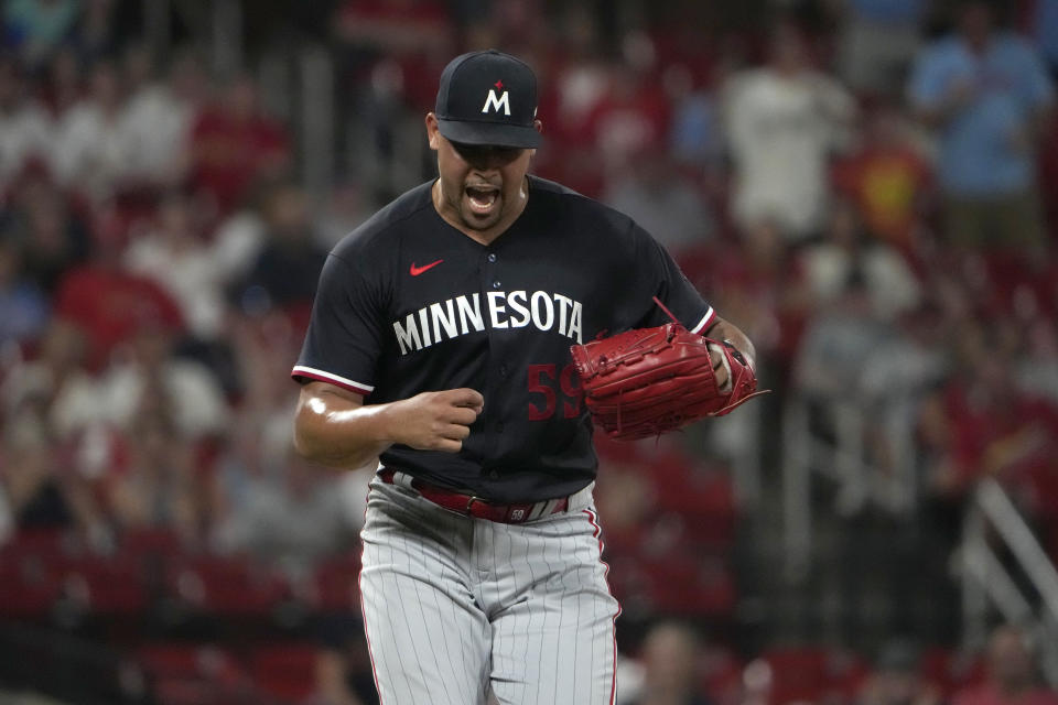 Minnesota Twins relief pitcher Jhoan Duran celebrates after striking out St. Louis Cardinals' Alec Burleson to end a baseball game Tuesday, Aug. 1, 2023, in St. Louis. The Twins won 3-2. (AP Photo/Jeff Roberson)