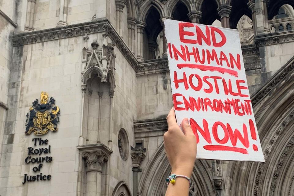 Demonstrators outside the Royal Courts of Justice, central London, protesting against the Government’s plan to send some asylum seekers to Rwanda, while a High Court hearing over the policy is ongoing (Tom Pilgrim/PA) (PA Wire)