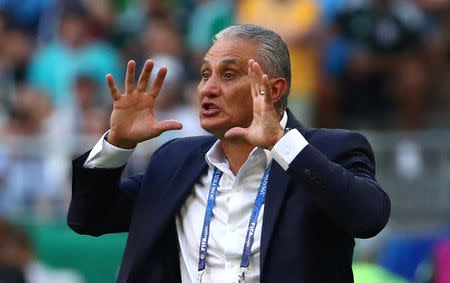 FILE PHOTO: Soccer Football - World Cup - Round of 16 - Brazil vs Mexico - Samara Arena, Samara, Russia - July 2, 2018 Brazil coach Tite gestures during the match REUTERS/Michael Dalder