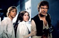 <p>Fisher as Princess Leia, her most notable, world-famous role, with Mark Hamill and Harrison Ford, 1977. Fisher recently admitted to having had an affair with Ford during the filming, at a time when he was married. (Photo: Everett Collection)</p>