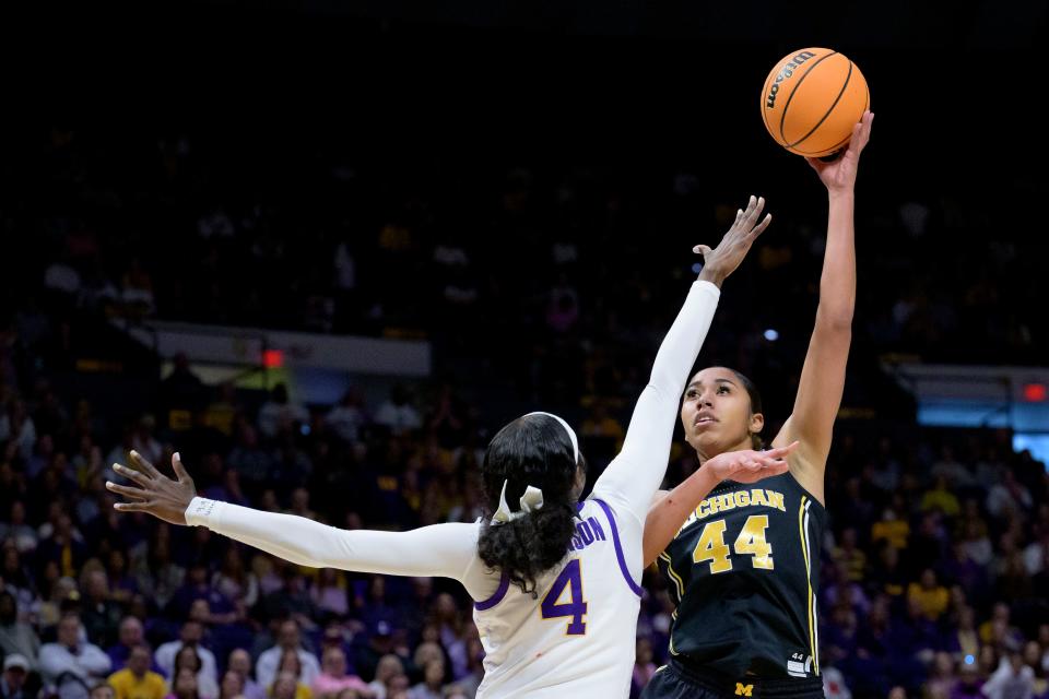 Michigan forward Cameron Williams shoots against LSU guard Flau'jae Johnson during the first half of a NCAA tournament game in Baton Rouge, Louisiana, on Sunday, March 19, 2023.