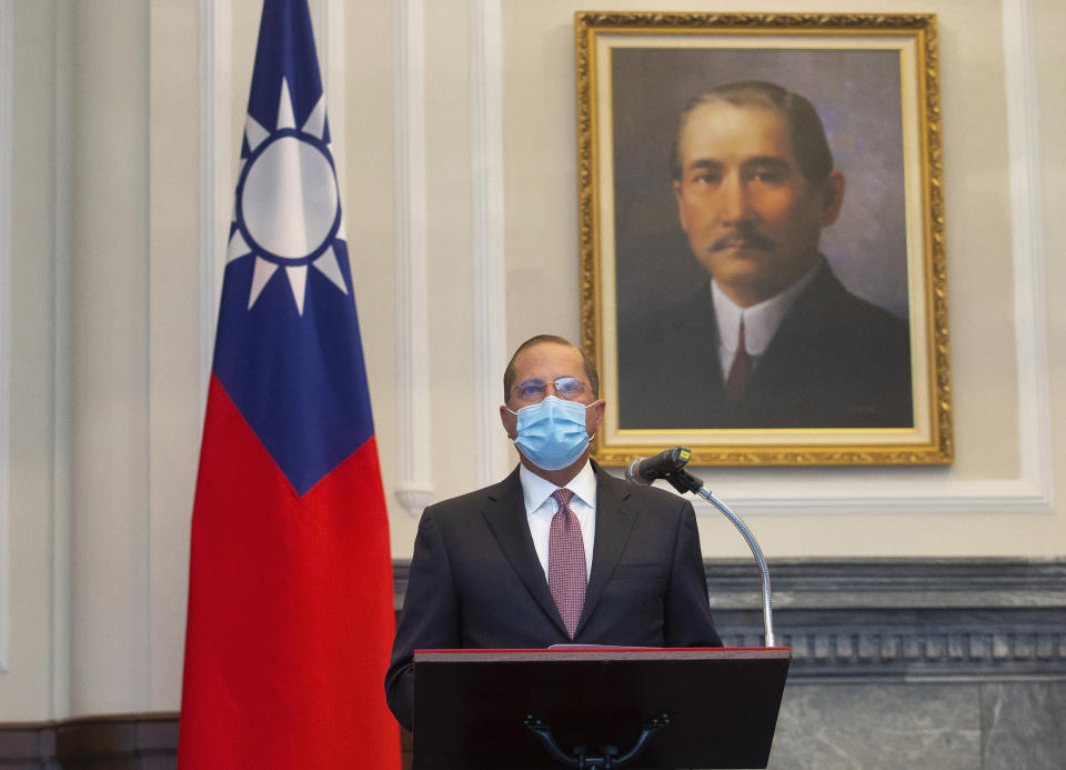 U.S. Health and Human Services Secretary Alex Azar speaks during a meeting with Taiwan's President Tsai Ing-wen, unseen, in front of a portrait of Sun Yat-sen, who is widely regarded as the founding father of modern China, in Taipei, Taiwan, Monday, Aug. 10, 2020. Azar arrived in Taiwan on Sunday in the highest-level visit by an American Cabinet official since the break in formal diplomatic relations between Washington and Taipei in 1979. (Central News Agency Pool via AP Photo)